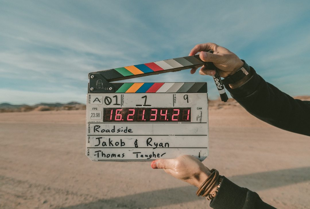 An image of a clapperboard used in filmmaking.