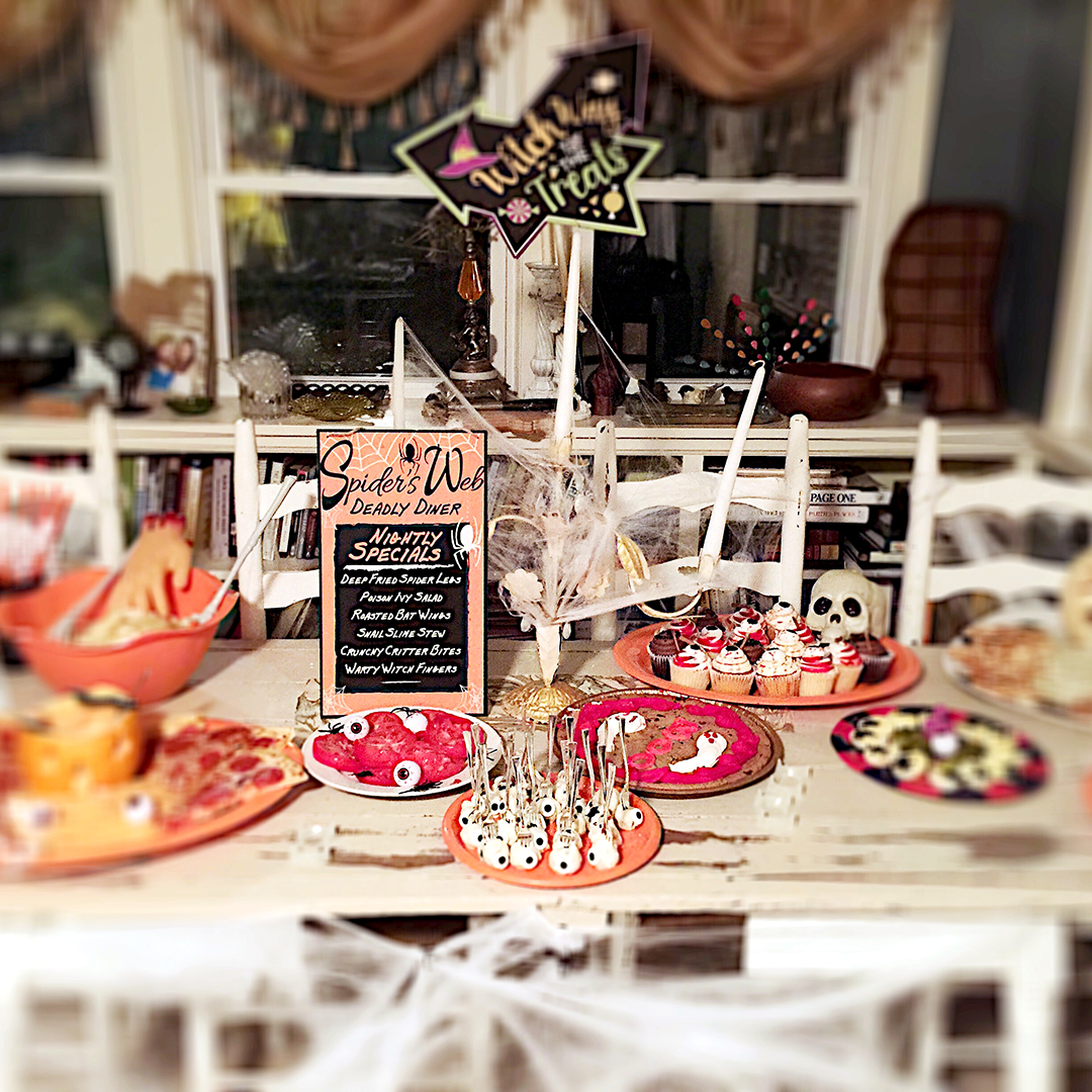 A Halloween party scene with Halloween-themed food.