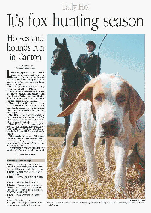 An article featuring fox hunters on horses and their dogs.