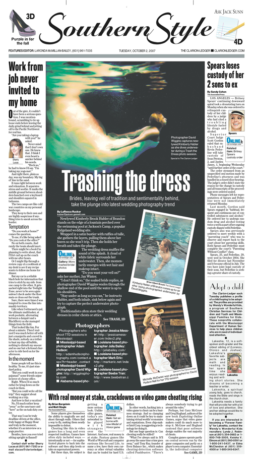 A picture of a newspaper page featuring a photo of a bride driving underwater in her wedding gown for a photo shoot about "trashing the dress."
