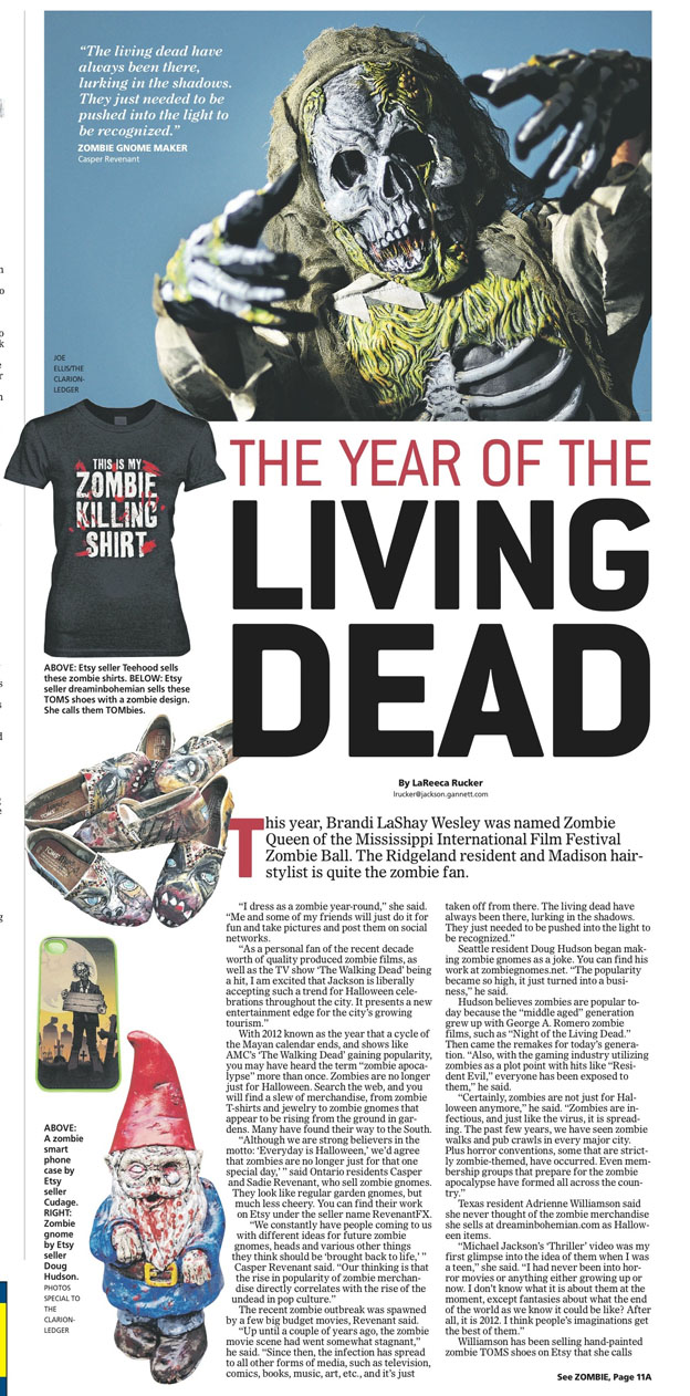 A photo of a newspaper page about the zombie trend that reads "The Year of the Living Dead."